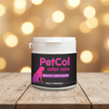PetCol Colon Care on rustic wood with warm bokeh